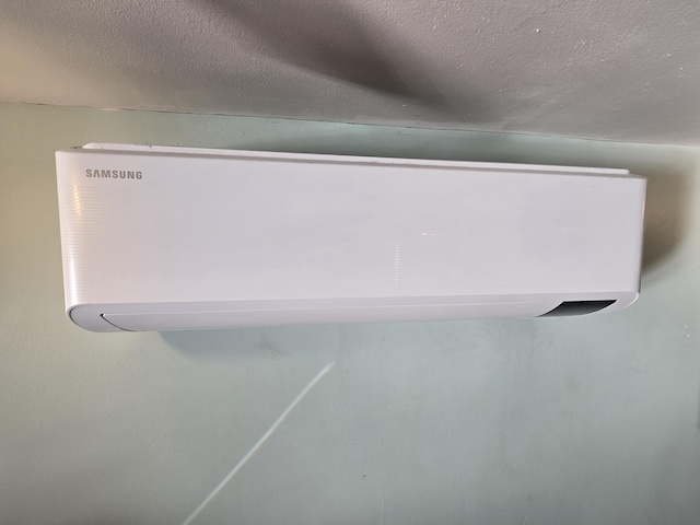 room details featuring a wall unit AC
