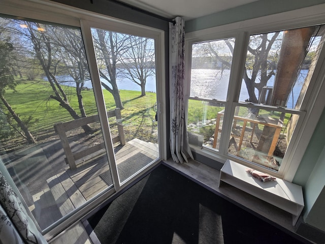 interior details featuring a water view