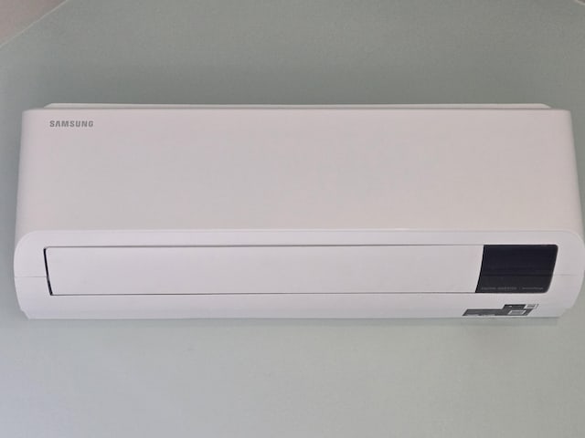 interior details with a wall mounted air conditioner