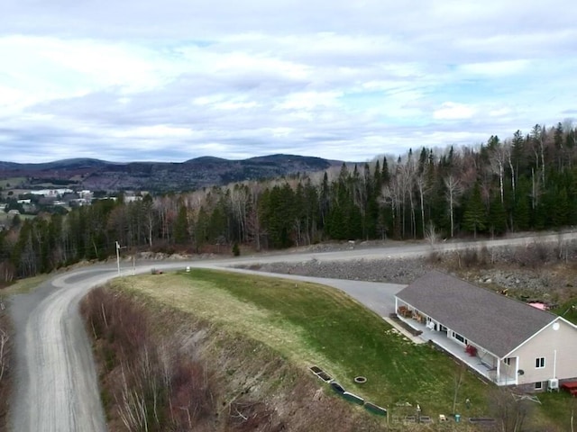 35 Carson Ln, Fort Kent, ME 04743 - view of street with a forest view and a mountain view
