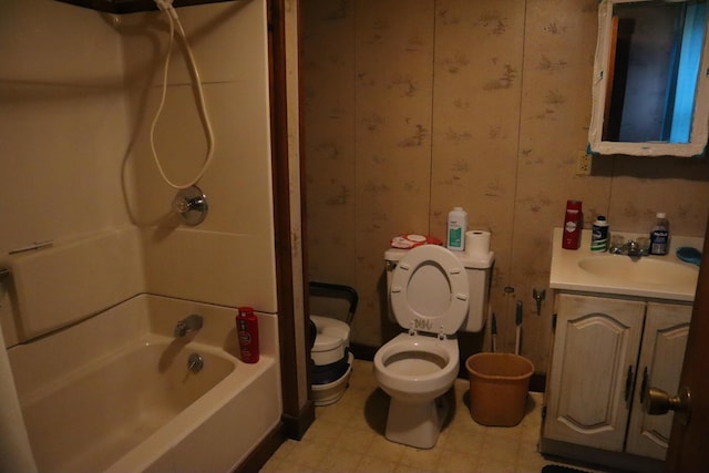 73 Milburn St, Skowhegan, ME 04976 - full bathroom with toilet, tub / shower combination, vanity, and tile patterned floors