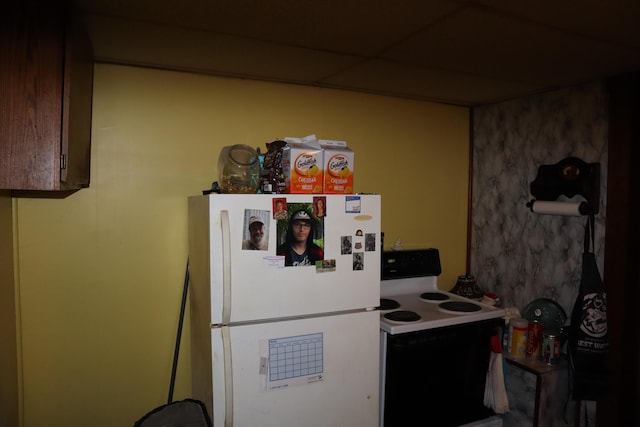 73 Milburn St, Skowhegan, ME 04976 - kitchen featuring freestanding refrigerator and electric range oven