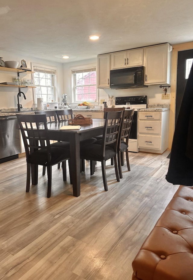 178 Frost Hill Rd, Norway, ME 04268 - dining room featuring light wood-style floors and recessed lighting