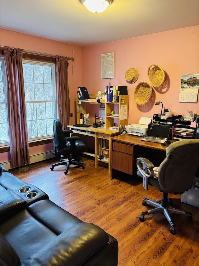 71 Reynolds Rd, Brooks, ME 04921 - office with wood finished floors, healthy amount of natural light, and baseboard heating