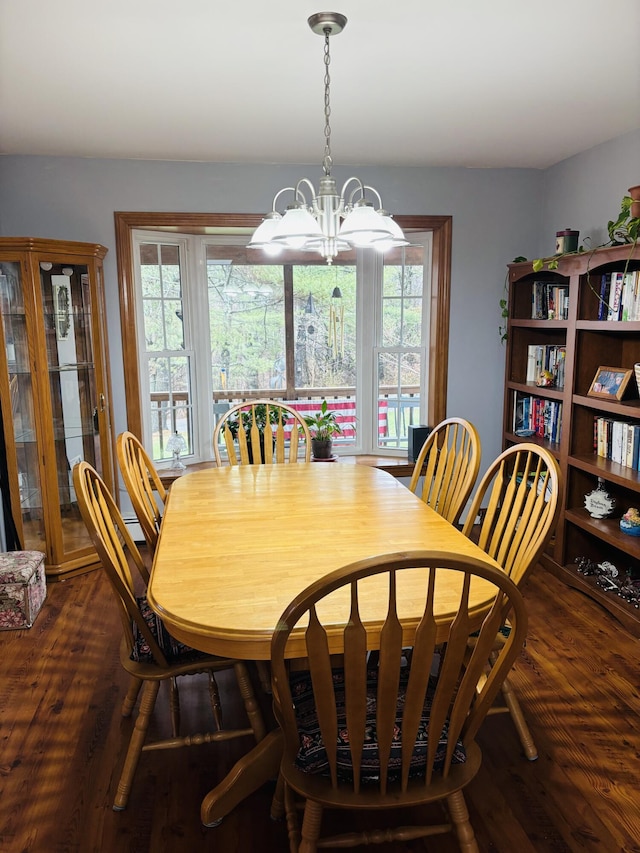 71 Reynolds Rd, Brooks, ME 04921 - dining space with dark wood-style floors and a chandelier