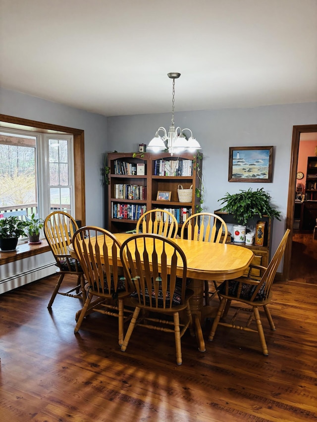 71 Reynolds Rd, Brooks, ME 04921 - dining space featuring a chandelier and wood finished floors