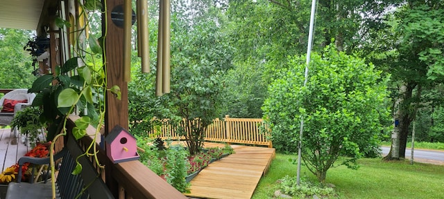 71 Reynolds Rd, Brooks, ME 04921 - surrounding community with a wooden deck and a yard