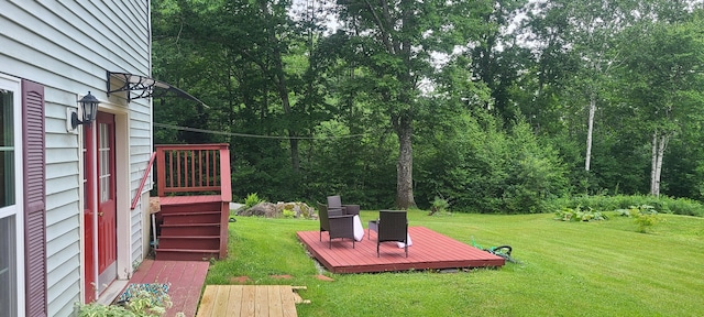 71 Reynolds Rd, Brooks, ME 04921 - view of grassy yard with a deck