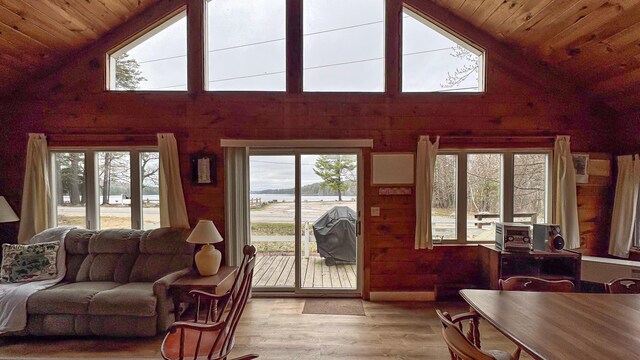 676 S High St, Bridgton, ME 04009 - living area with wooden ceiling, a wealth of natural light, high vaulted ceiling, and wood finished floors