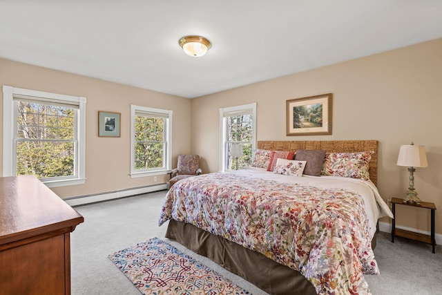 4 Geary Way, Falmouth, ME 04105 - bedroom with a baseboard radiator, light colored carpet, multiple windows, and baseboards