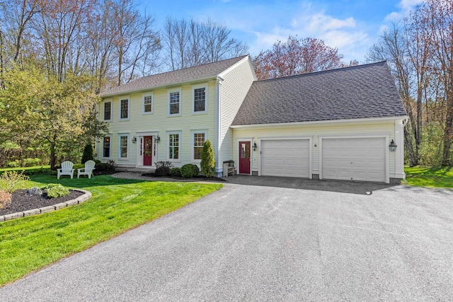 4 Geary Way, Falmouth, ME 04105 - colonial inspired home featuring an attached garage, asphalt driveway, a front yard, and a shingled roof