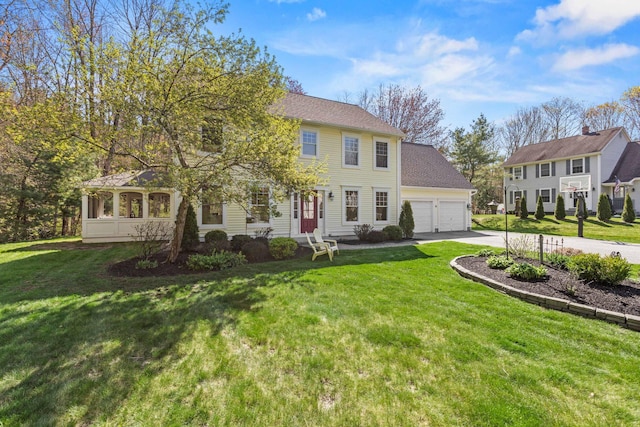 4 Geary Way, Falmouth, ME 04105 - colonial home with an attached garage, driveway, and a front lawn