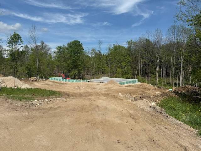 3 Gabriels Way, Turner, ME 04282 - view of play area featuring a forest view