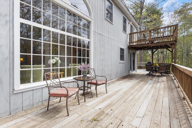25 Sawmill Ln, Ogunquit, ME 03907 - wooden terrace with outdoor dining area