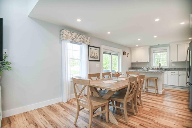 10 Haleys Ct Unit 22, Wells, ME 04090 - dining space featuring recessed lighting, light wood-style floors, and baseboards