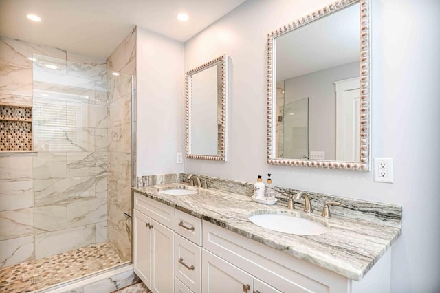 10 Haleys Ct Unit 22, Wells, ME 04090 - bathroom featuring a stall shower, recessed lighting, and double vanity