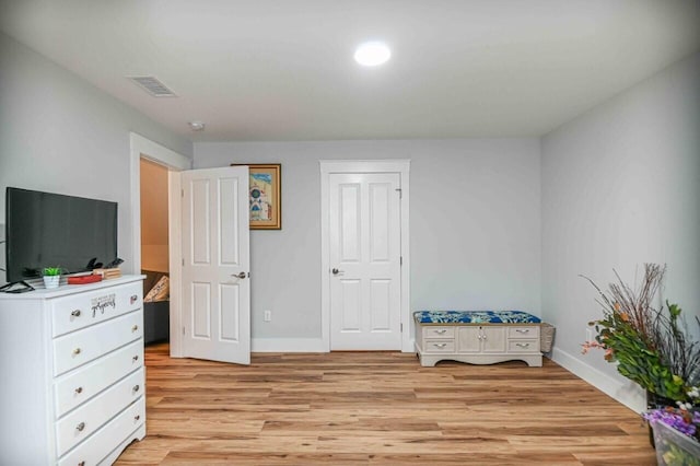 10 Haleys Ct Unit 22, Wells, ME 04090 - bedroom with light wood finished floors and baseboards