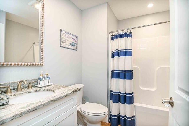 10 Haleys Ct Unit 22, Wells, ME 04090 - bathroom featuring toilet, shower / bath combo, vanity, and recessed lighting
