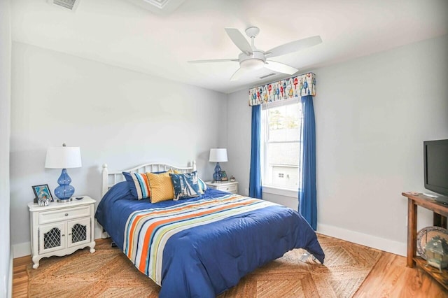 10 Haleys Ct Unit 22, Wells, ME 04090 - bedroom featuring baseboards, ceiling fan, and wood finished floors