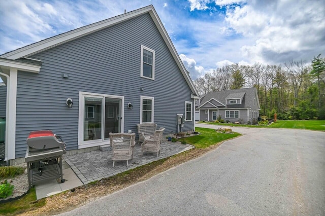 10 Haleys Ct Unit 22, Wells, ME 04090 - back of property featuring a patio