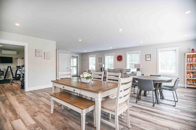 10 Haleys Ct Unit 22, Wells, ME 04090 - dining space with recessed lighting, light wood-style floors, an AC wall unit, and baseboards