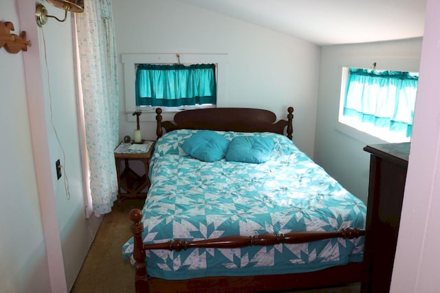 68 Salmon Rd, Madison, ME 04950 - carpeted bedroom with vaulted ceiling