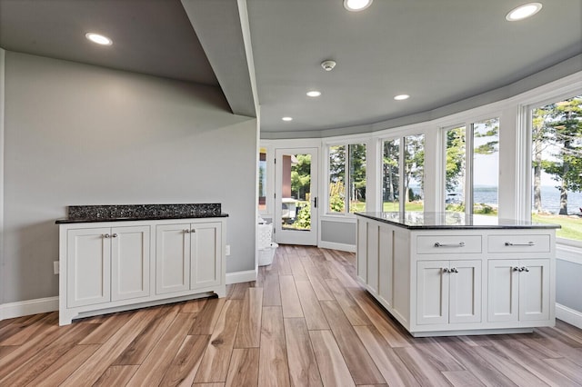 129 Loon Call Dr, Belgrade, ME 04917 - kitchen featuring white cabinetry, light wood-type flooring, recessed lighting, and baseboards