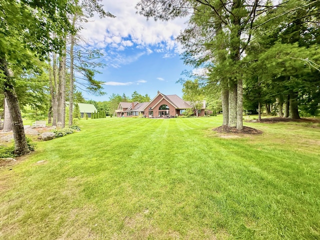129 Loon Call Dr, Belgrade, ME 04917 - view of grassy yard