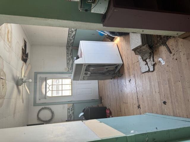 kitchen featuring wood walls