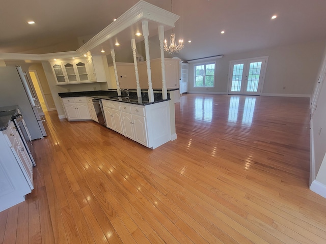 239 Pierce Rd Unit 2B, Brewer, ME 04412 - kitchen with stainless steel appliances, open floor plan, a chandelier, light wood-style flooring, and recessed lighting