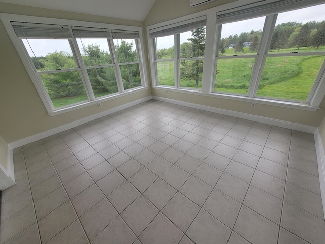 239 Pierce Rd Unit 2B, Brewer, ME 04412 - unfurnished sunroom with baseboards, healthy amount of natural light, tile patterned flooring, and vaulted ceiling