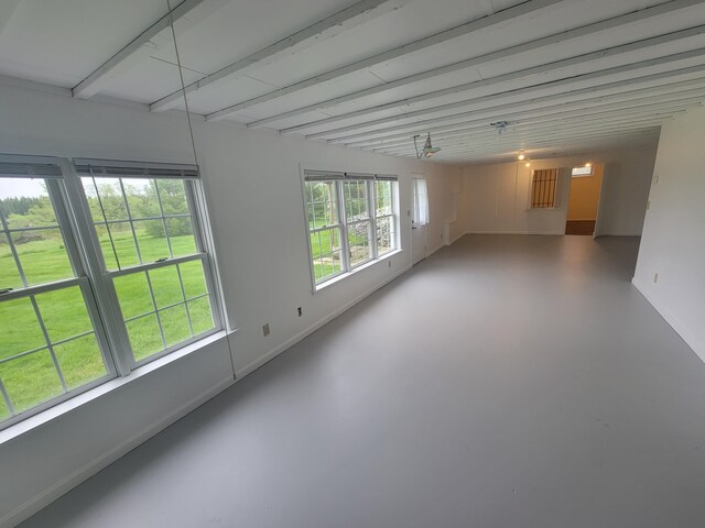 239 Pierce Rd Unit 2B, Brewer, ME 04412 - unfurnished room featuring concrete flooring, baseboards, and beam ceiling