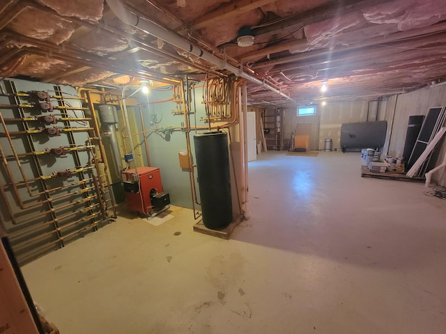 239 Pierce Rd Unit 2B, Brewer, ME 04412 - below grade area with gas water heater, a heating unit, and heating fuel