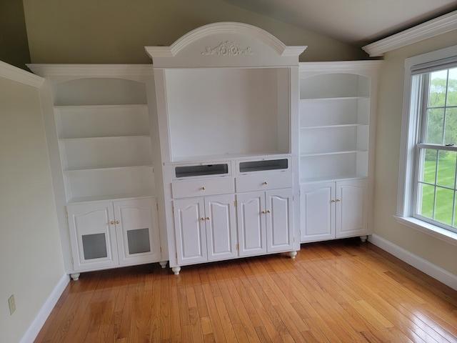 239 Pierce Rd Unit 2B, Brewer, ME 04412 - unfurnished living room with baseboards, light wood-type flooring, and built in features
