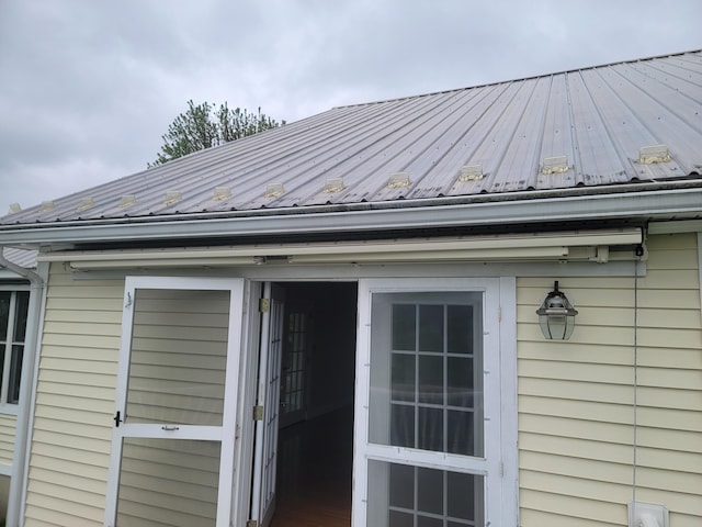 239 Pierce Rd Unit 2B, Brewer, ME 04412 - exterior view of gutters, a downspout, and metal roof
