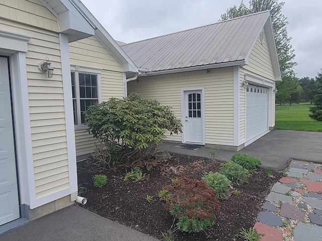 239 Pierce Rd Unit 2B, Brewer, ME 04412 - garage featuring asphalt driveway