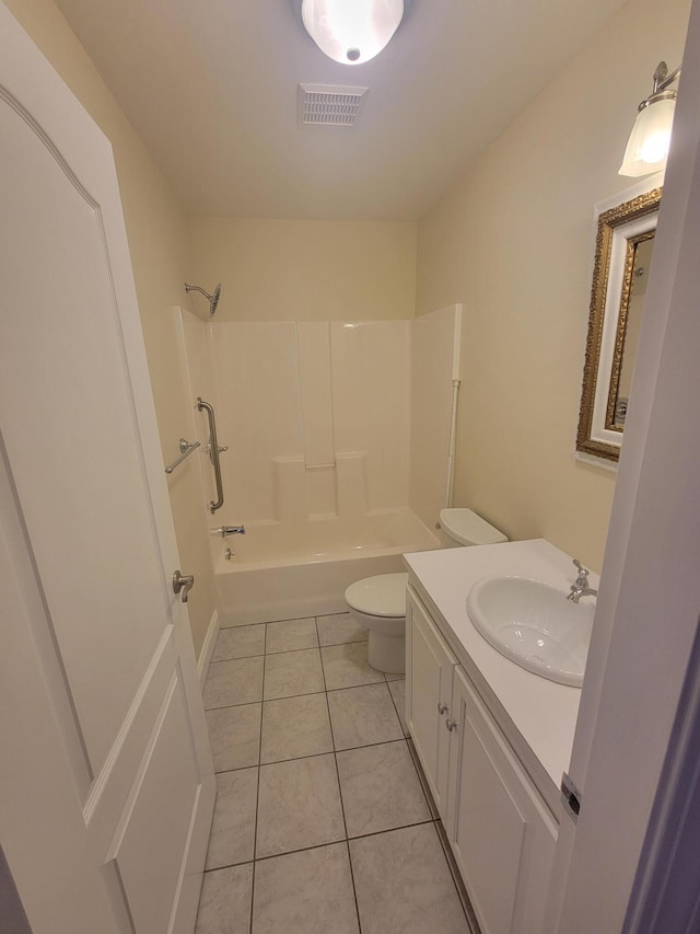 239 Pierce Rd Unit 2B, Brewer, ME 04412 - bathroom featuring toilet,  shower combination, vanity, and tile patterned flooring