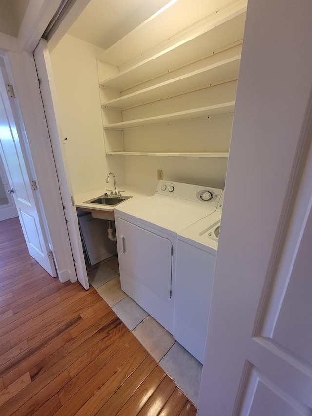 239 Pierce Rd Unit 2B, Brewer, ME 04412 - laundry room with washing machine and dryer and light wood-type flooring