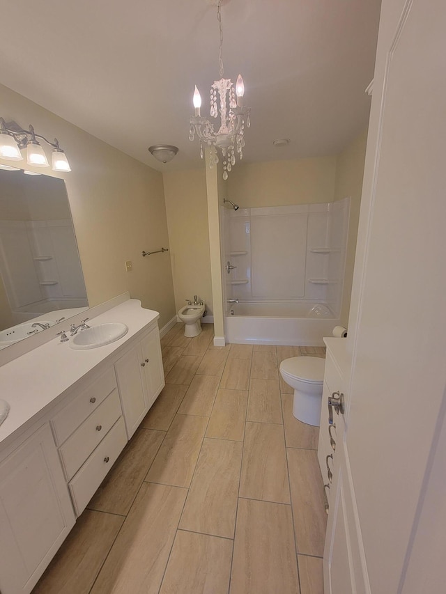 239 Pierce Rd Unit 2B, Brewer, ME 04412 - bathroom with toilet, double vanity, shower / bath combination, and a bidet