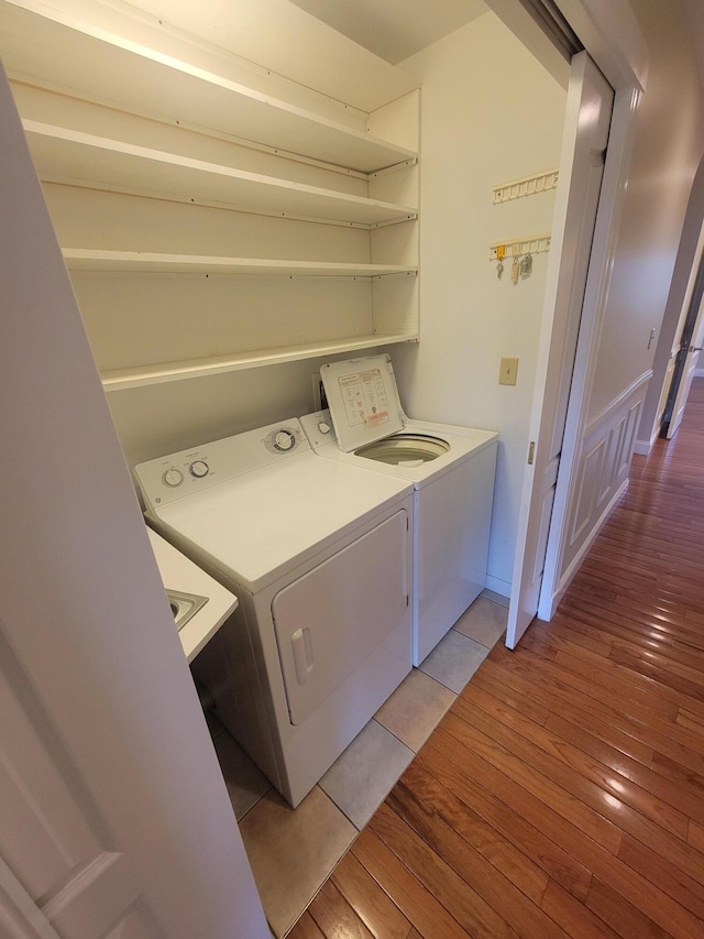 239 Pierce Rd Unit 2B, Brewer, ME 04412 - laundry room featuring separate washer and dryer and light wood finished floors