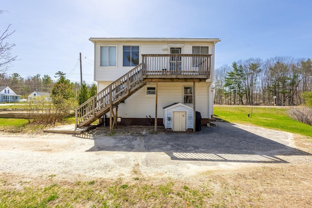 2 Airport Rd, Turner, ME 04282 - rear view of house with a deck and stairs