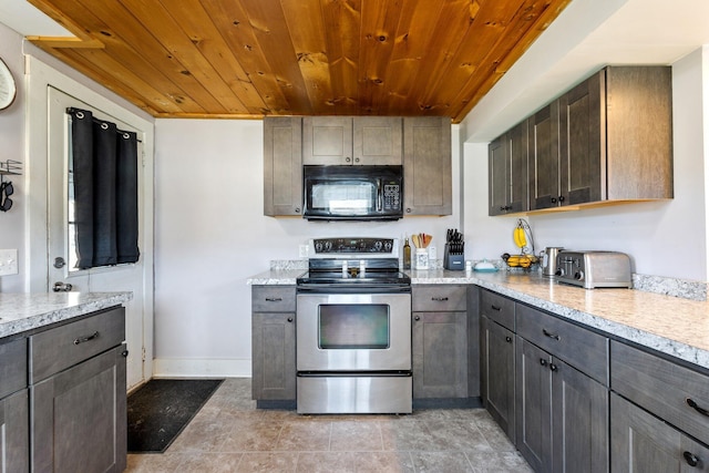 2 Airport Rd, Turner, ME 04282 - kitchen featuring black microwave, stainless steel electric stove, wood ceiling, baseboards, and light stone counters
