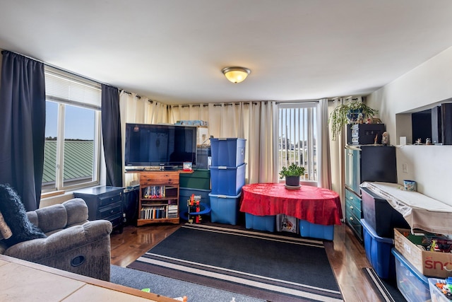 2 Airport Rd, Turner, ME 04282 - living area featuring plenty of natural light and wood finished floors