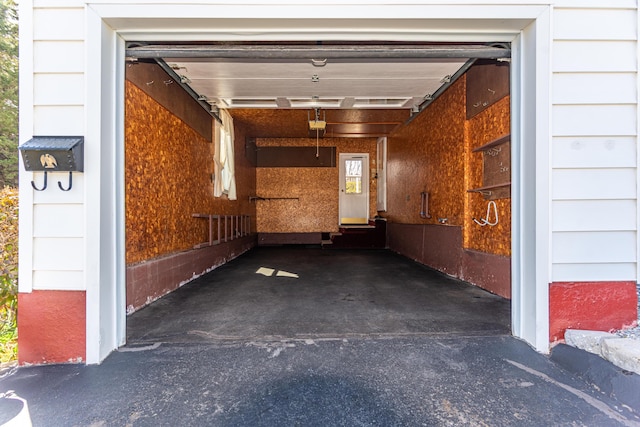 garage featuring driveway