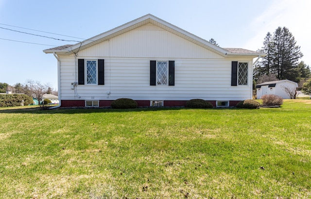view of property exterior with a yard