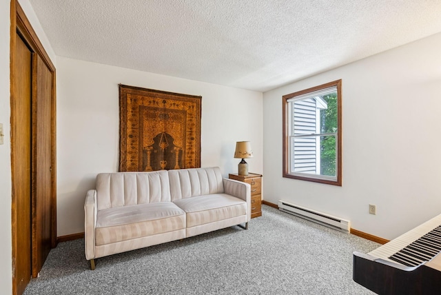 55 Lambert St Unit 4, Portland, ME 04103 - carpeted living area with baseboard heating, baseboards, and a textured ceiling