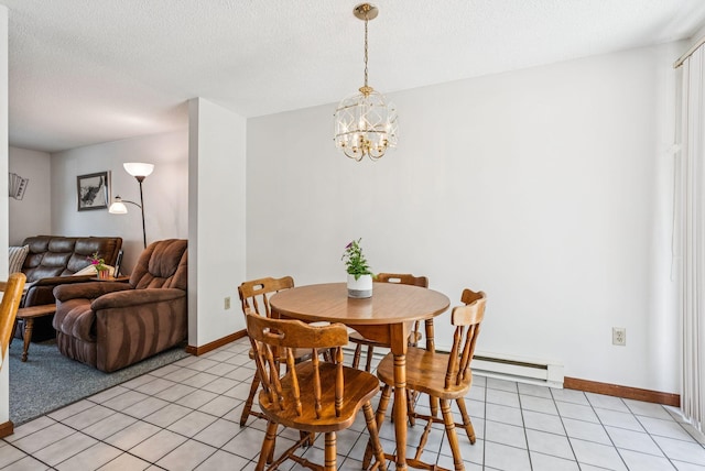 55 Lambert St Unit 4, Portland, ME 04103 - dining space with light tile patterned floors, a chandelier, baseboards, and a textured ceiling