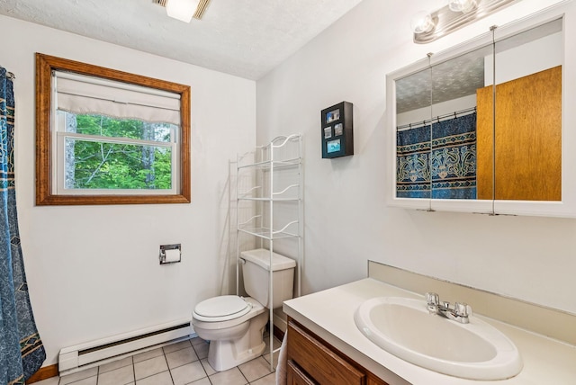 55 Lambert St Unit 4, Portland, ME 04103 - bathroom featuring a baseboard radiator, vanity, tile patterned floors, and toilet