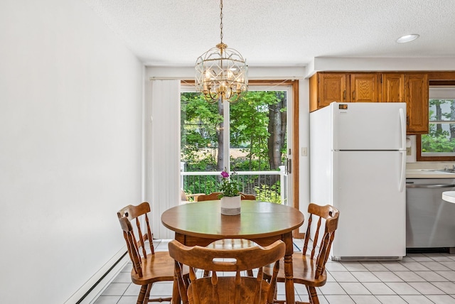 55 Lambert St Unit 4, Portland, ME 04103 - dining space with a textured ceiling, a chandelier, and light tile patterned floors