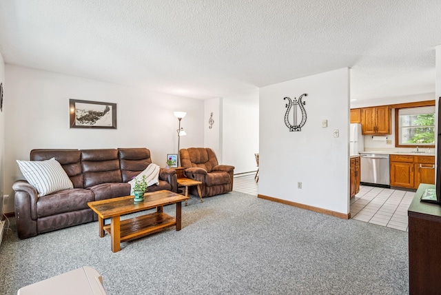 55 Lambert St Unit 4, Portland, ME 04103 - living area with light carpet, a textured ceiling, baseboards, a baseboard radiator, and light tile patterned floors